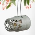 ESMEE: a peanut butter bird feeder made from recycled beverage containers